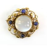 Moonstone and sapphire brooch, central round cabochon cut moonstone 14mm in diameter, set within a