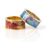 Two enamel rings, one with an abstract enamel motif in orange, yellows and greens, mounted in 18