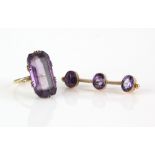 Edwardian three stone bar brooch, set with three oval cut amethysts, pin and catch fitting, 3.5 x