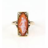 Cameo set plaque ring the corners set with rose cut diamonds, plaque1.8 x 0.8cm, mounted in 9 ct