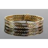 Vintage tri coloured gold bracelet, four rows of textured links, with central v shaped links,