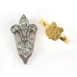 Art Deco small fleur-de- Lys diamond clip with old cut and rose cut stones, in unmarked white