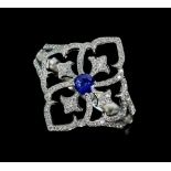 Contemporary diamond and sapphire openwork ring, in 18 ct white gold, signed Tivon, ring size N.