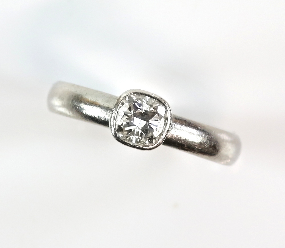 Modern diamond solitaire ring, estimated diamond weight 0.63 carats, mounted in platinum, ring