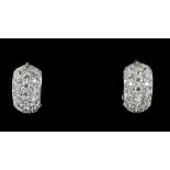 A pair of cubic zirconia pave set hoops, hinge clip fittings, mounted in 18 ct. CONDITION