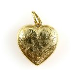 A vintage Austrian gold heart pendant, engraved with foliate design, 14 ct gold, Circa 1920's .