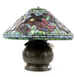 Tiffany style table lamp, metal base with coloured glass shade of floral decoration, 36cm high,. .