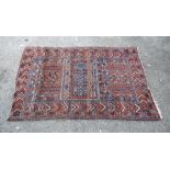 Afghan red ground prayer rug, 140cm x 92cm . .