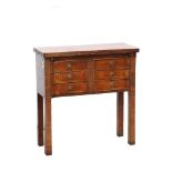 19th century mahogany fold-out table over six short drawers, on square supports, 76.5cm x 73.5cm x