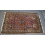 Caesarea (Turkish) red ground rug, 192cm x 120cm . .