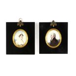 Pair of 19th century oval portrait miniatures depicting a gentleman in a black coat and a lady in