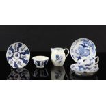 Two Lowestoft style dragon pattern cups and saucers, and another tea-bowl and saucer, and a cream