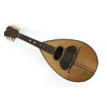 Italian rosewood eight string mandolin, bears label for Chsare Montaldi, Napoli, with case. .