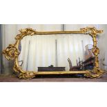19th century carved and gilt gesso over mantel mirror with extensive scroll work decoration, 210cm x