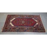 Borchelu (Turkish) red ground rug, 195cm x 117cm . .