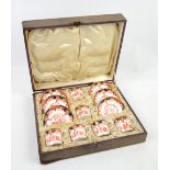 Royal Crown Derby set of six coffee cans and saucers in the Imari palette, date marks for 1910, in