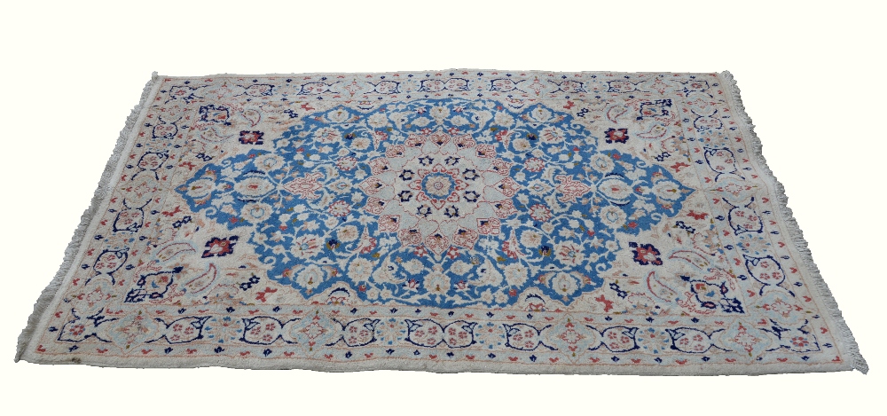 Nain (iran) silk and wool cream ground carpet 205cm x 127cm . .