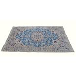 Nain (iran) silk and wool cream ground carpet 205cm x 127cm . .