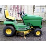 John Deere ride on petrol Mower, with trailer and aerator all in green. Note this items is