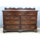 Late 18th/ 19th century oak mule chest with lift-up top over five dummy drawers and four short