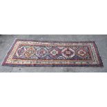 Late 19th early 20th century Kazak Runner, 286cm x 100cm . .