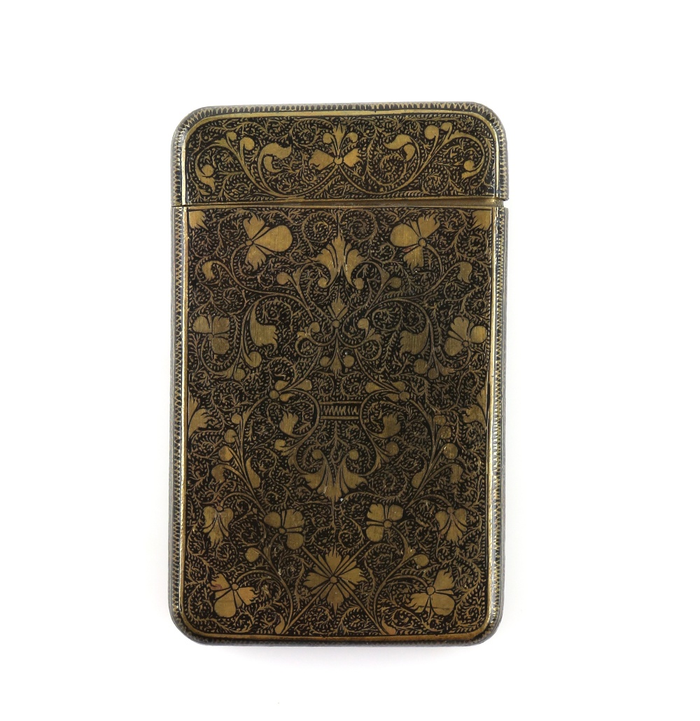 Indian metal card case with all over flower and foliage decoration, 9.5 x 5.5 cms Provenance; a