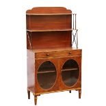 Late 19th century mahogany waterfall bookcase with shelves over a single drawer and glazed cupboard,