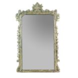 Late 19th/ early 20th century gilt gesso and painted mirror with scrolling foliate decoration,