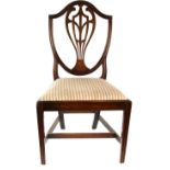 Set of six 19th century mahogany dining chairs with shield shaped splat backs, . .