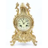 Louis XVI style gilt metal mantel clock with two train movement striking on a bell 30cm . .