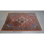 Persian Sarouk red ground rug, 152cm x 110cm . .