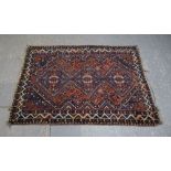 Iranian Shiraz red ground rug, 160cm x 116cm . .