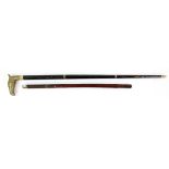 Howell 'Pathfinder' leather and brass mounted walking/swagger torch stick, 61cm long, and a four