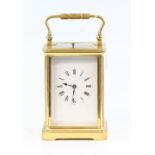 Brass and glass carriage clock with repeating lever movement, 18cm . .