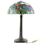 Tiffany style pewter lamp base with coloured glass shade decorated with flowers, 55cm high,. .