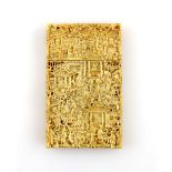 19th century Chinese bone card case with profuse decoration of figures in gardens, 9.5 x 6