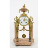 19th century French gilt-metal and pink marble mantle clock, with two train movement striking on a