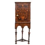 18th Century Dutch mahogany and marquetry inlaid corner cabinet with a single cupboard door on later