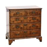 18th century walnut chest with brushing slide over two short and three long drawers, on bracket