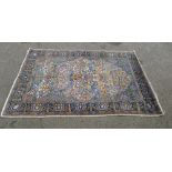 Persian silk cream ground rug, the centre with a flowering shrub, 170 x 120 cm . .