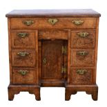 18th century walnut kneehole desk with herringbone cross-banding, with long single drawer, central