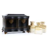 19th century ebonised and boulle perfume bottle box of serpentine form with hinged cover and doors