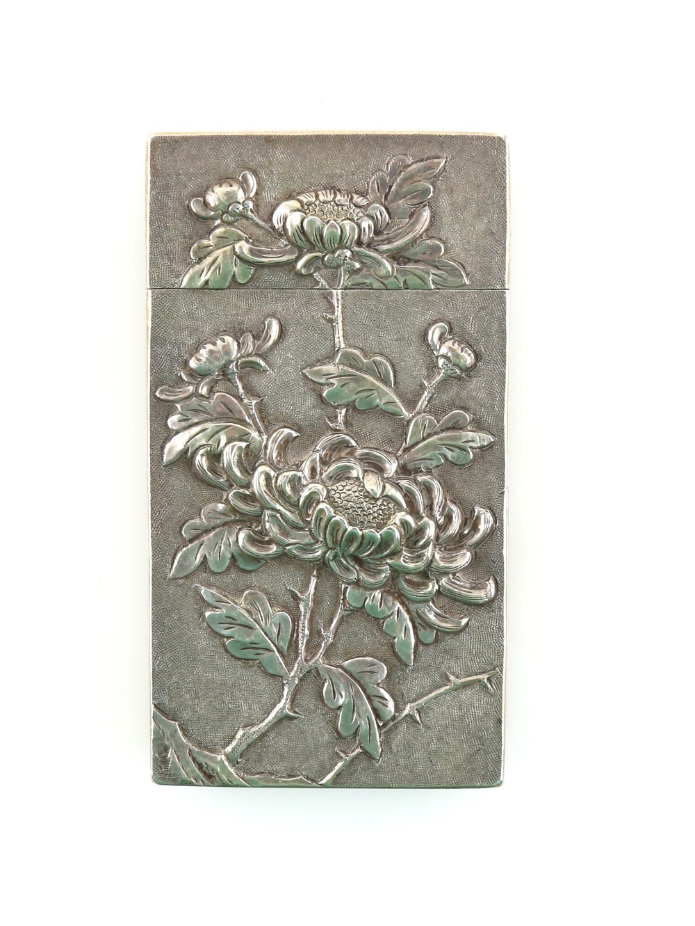 Chinese silver card case decorated with flowers and foliage in relief, the reverse with bamboo, 8.