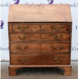 19th Century mahogany bureau, the fall front with fitted interior with four drawers to bracket