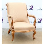19th Century mahogany arm chair with padded arms back and seats on cabriole legs. .