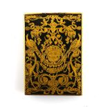 Black lacquered and gilt card case decorated on both sides with a central mask and foliage, 10 x