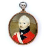 Early 19th C portrait miniature of a young man in military uniform, painted on ivory, reverse hair