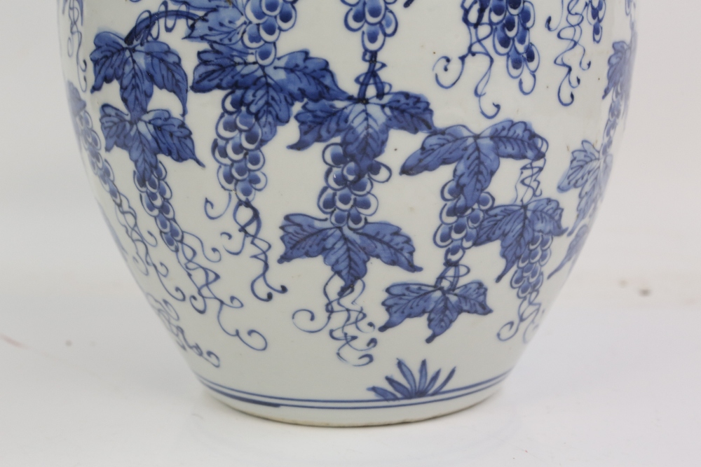 A blue and white vase with unglazed base, decorated with fruiting vine, 24 cm high; together with - Image 23 of 27