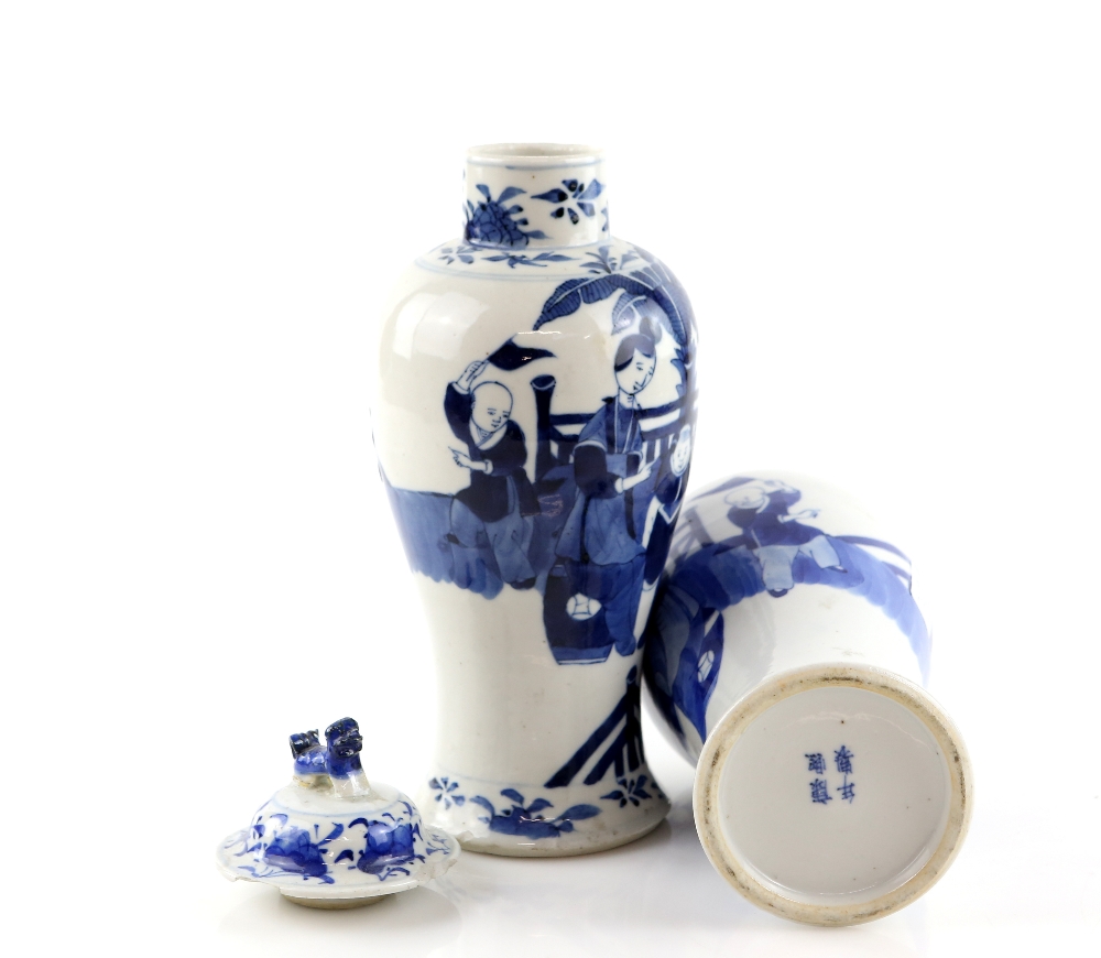 A pair of Chinese blue and white vases; each one with a domed cover and dog-of-fo finial, - Image 5 of 8