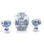 A blue and white oviform jar in the late Ming style, about 17 cm high; together with two blue and